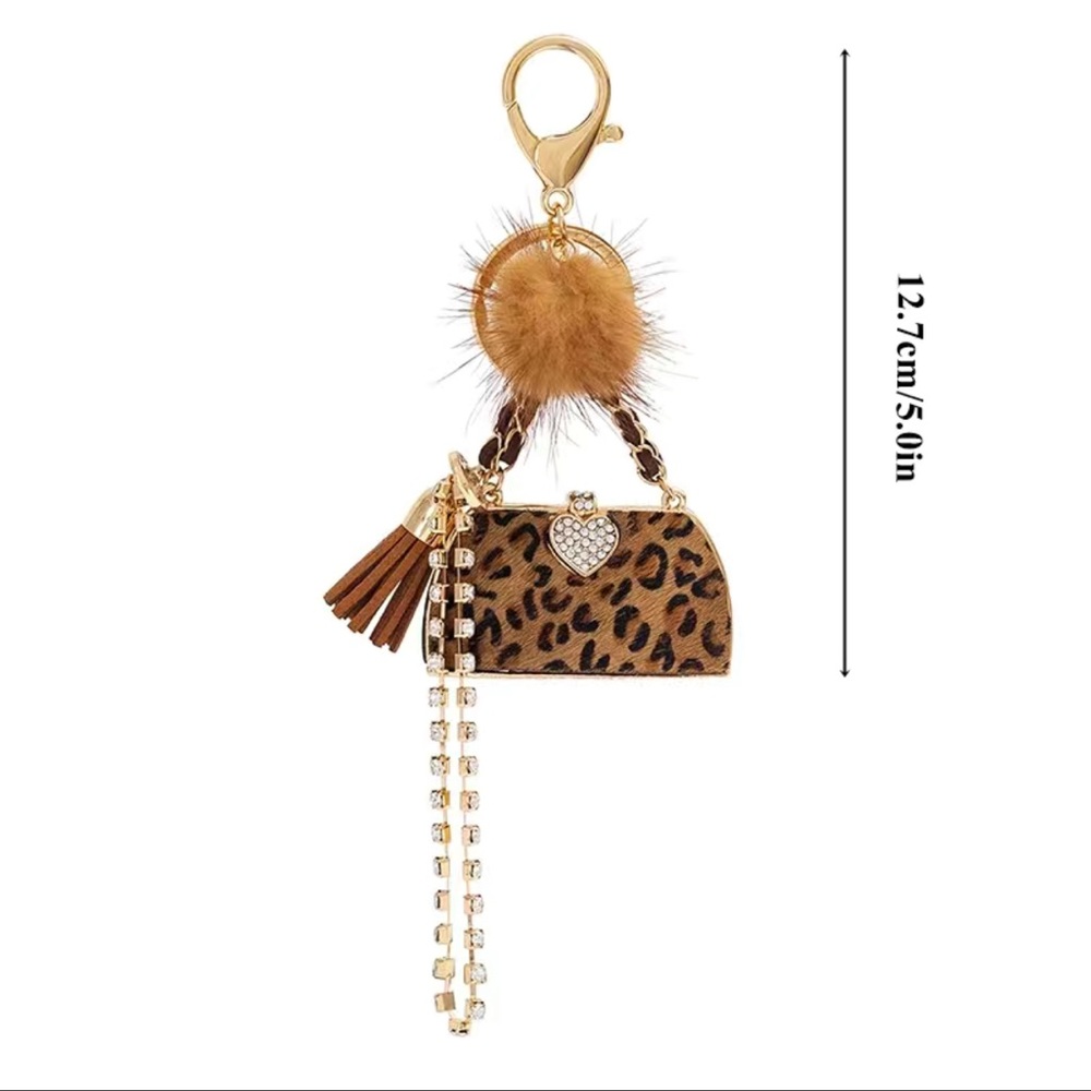 NWT Cheetah Keychain/Bag Charms clip it on wear it in so many ways it’s stylish - Picture 4 of 7